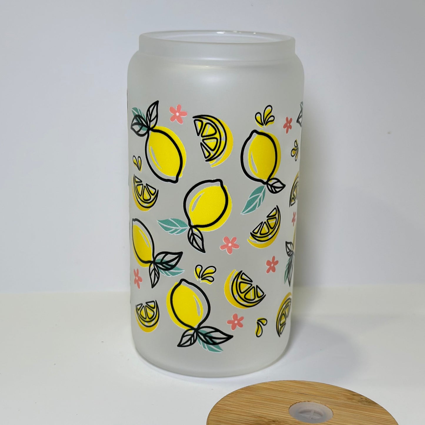Glass cup with lemon and flowers illustrations